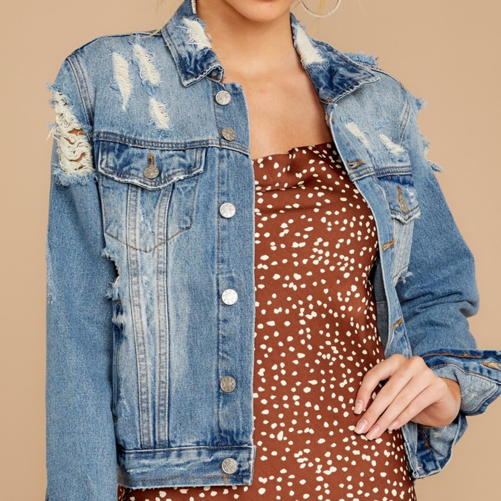 Distressed denim jacket